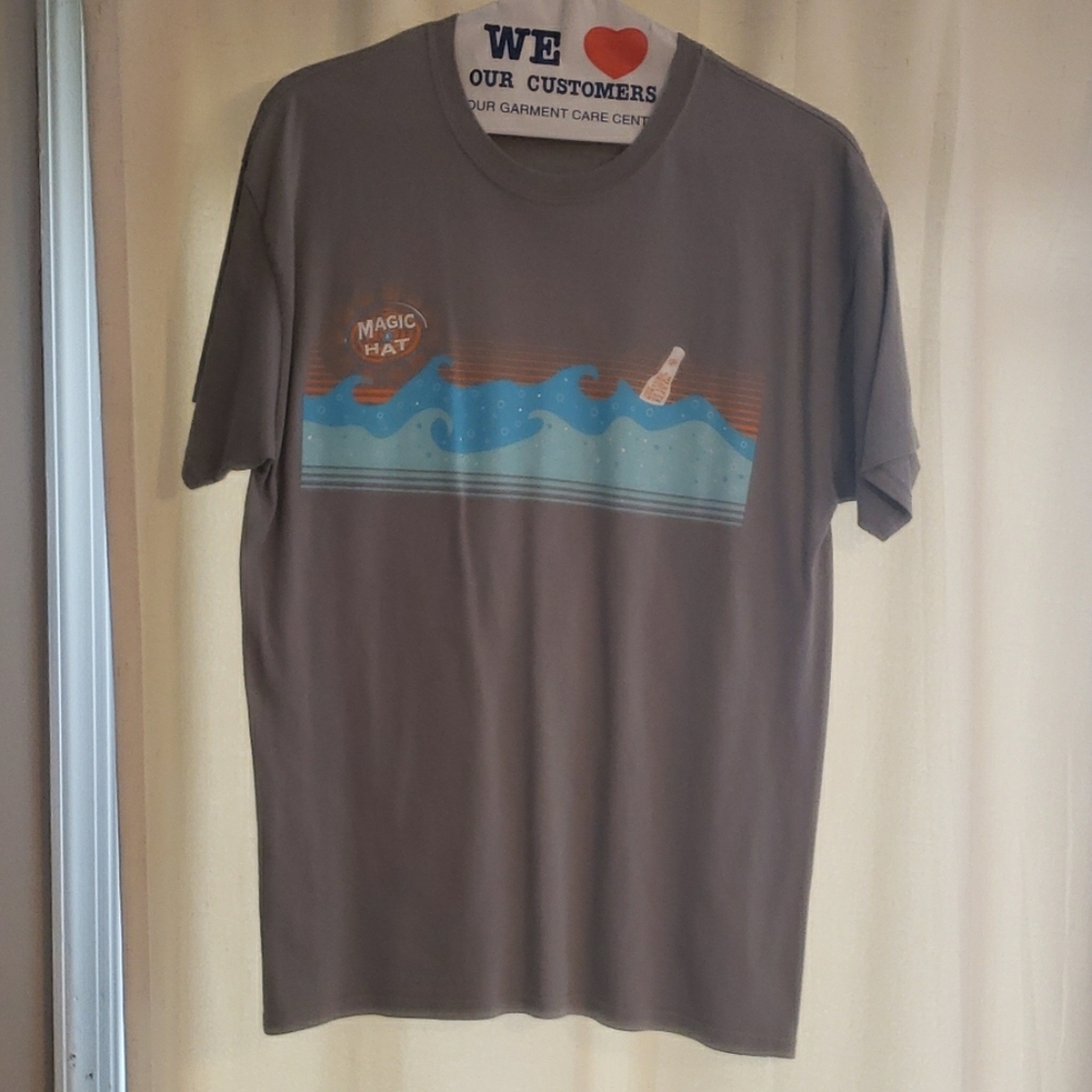 A gray magic hat tshirt